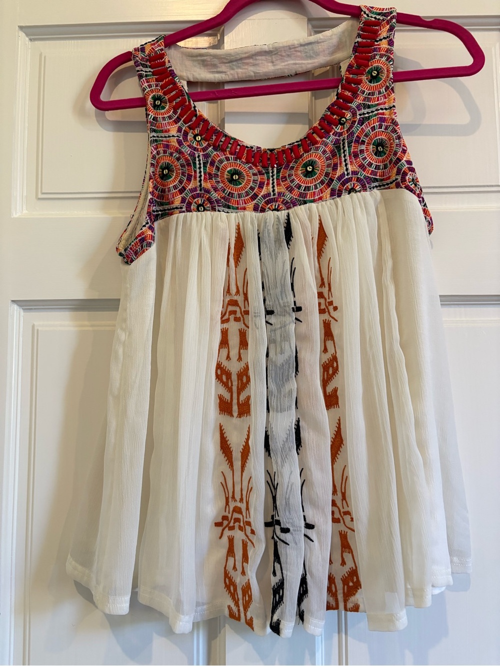 White Sleeveless Embroidered Yoke Tunic with Multicolor Accents